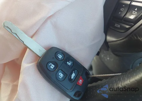 2012 Honda Odyssey Ex-L z USA, uszkodzony, nr VIN 5FNRL5H60CB067627